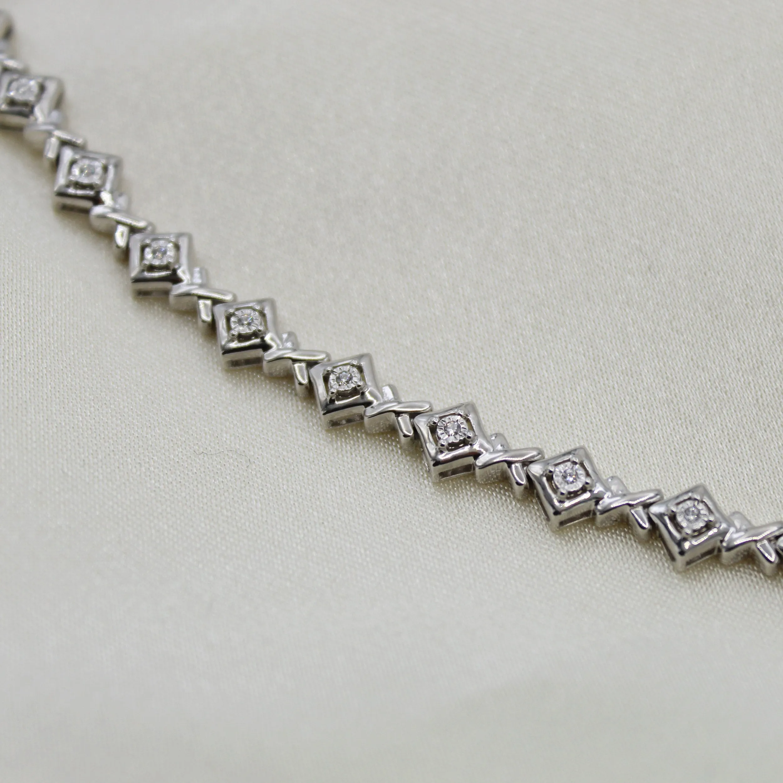 1/6ct tw Diamond XO Tennis Bracelet in Sterling Silver