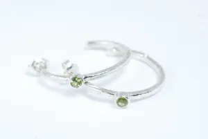 Silver hoops earrings with green peridot stone