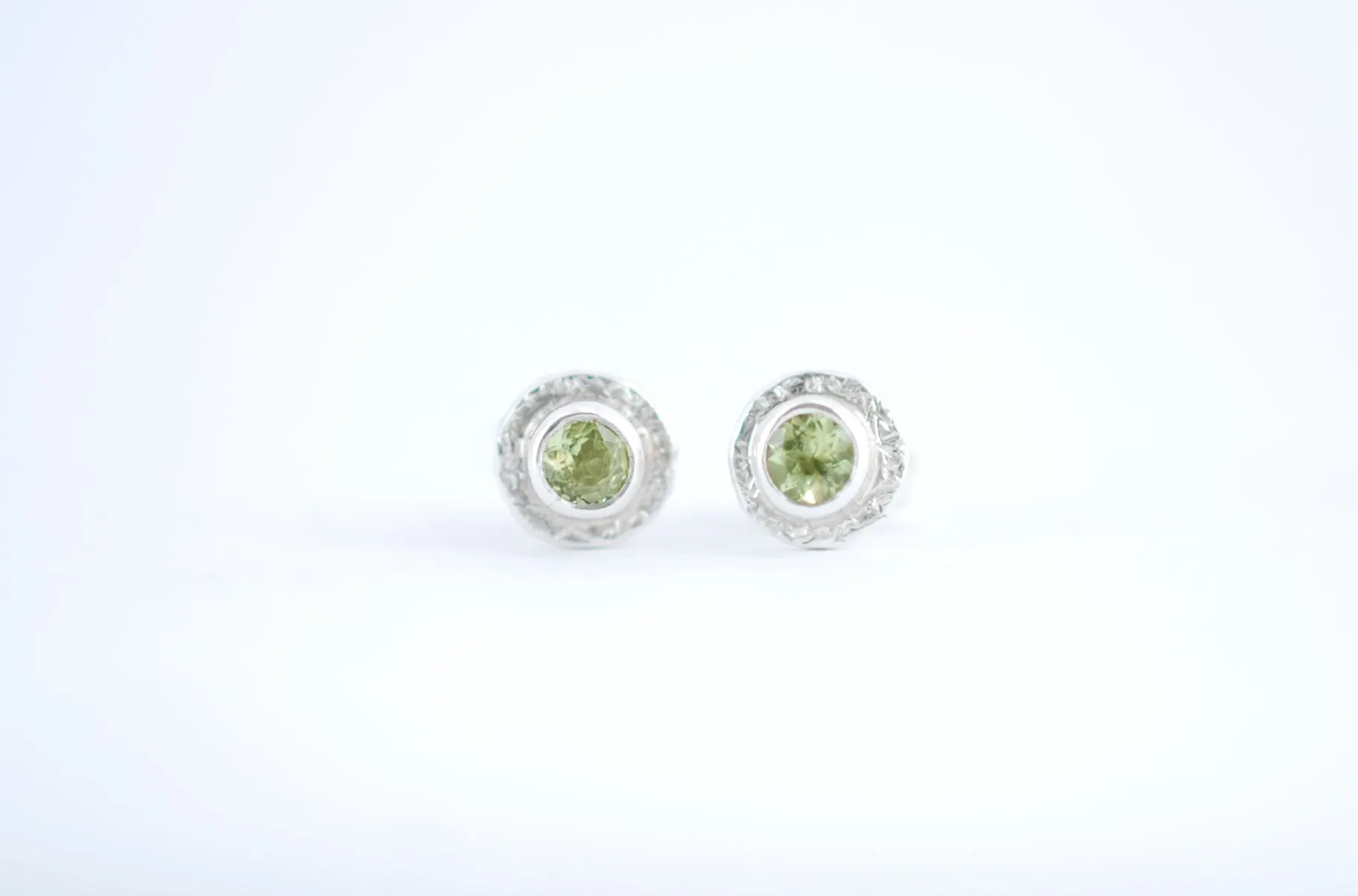 Silver stud earrings with green Peridot gemstone